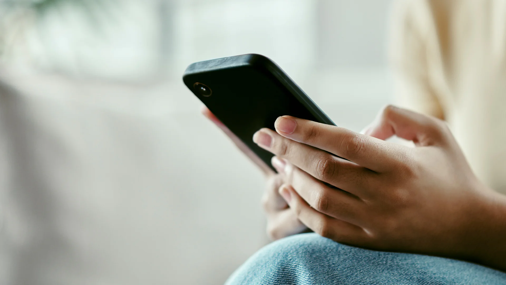 Hand holding phone