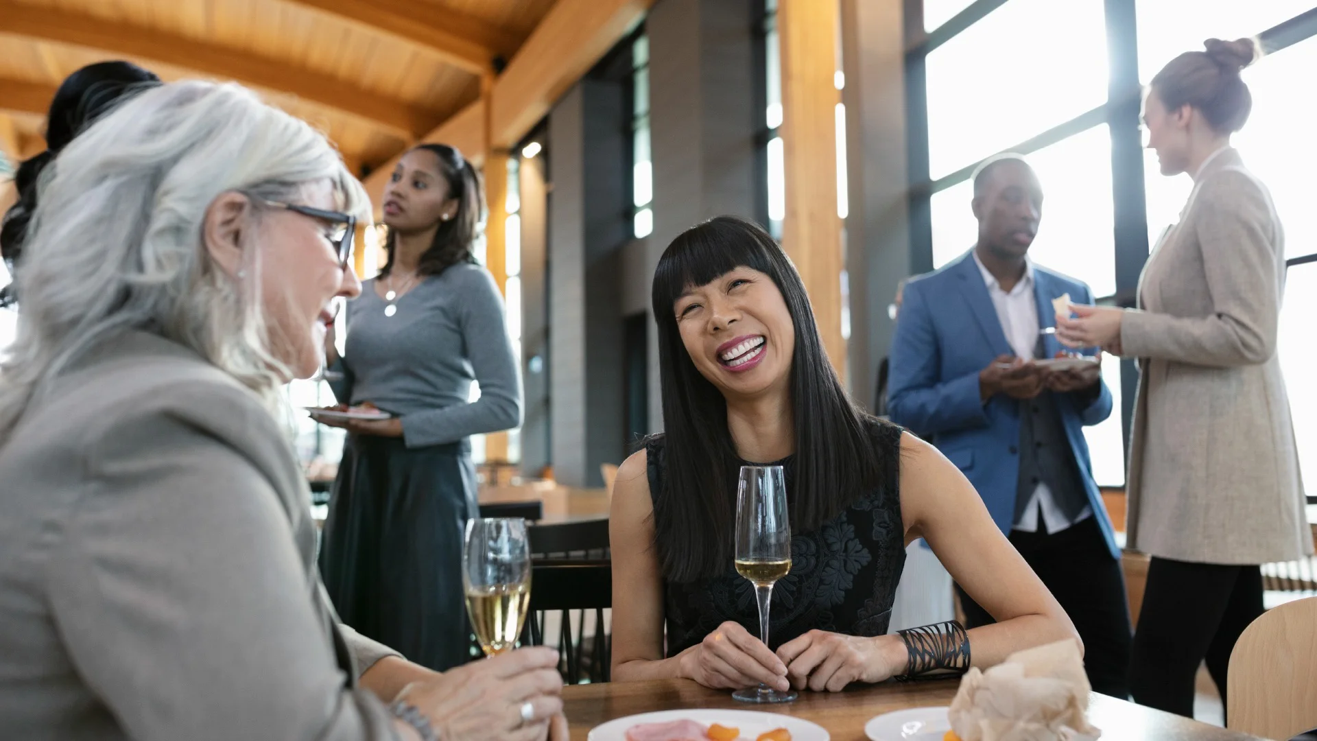 people smiling and eating