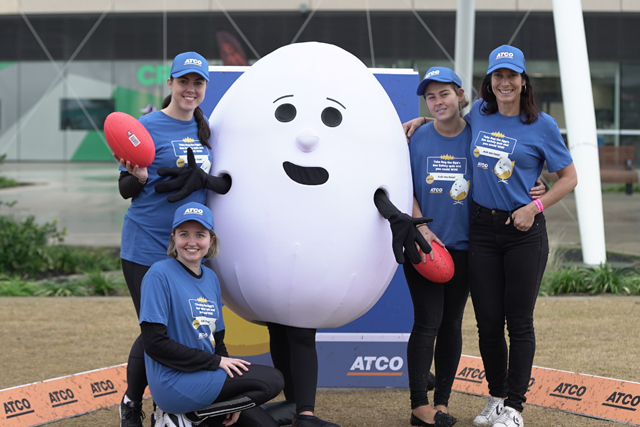 Image of Reg the Egg with staff promoting the ATCO winter safety campaign