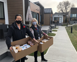 ATCO volunteers donating food to the veterans in ATCO Village, Calgary